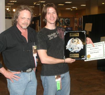 artshow Matt Hughes accepts the Best in Show award